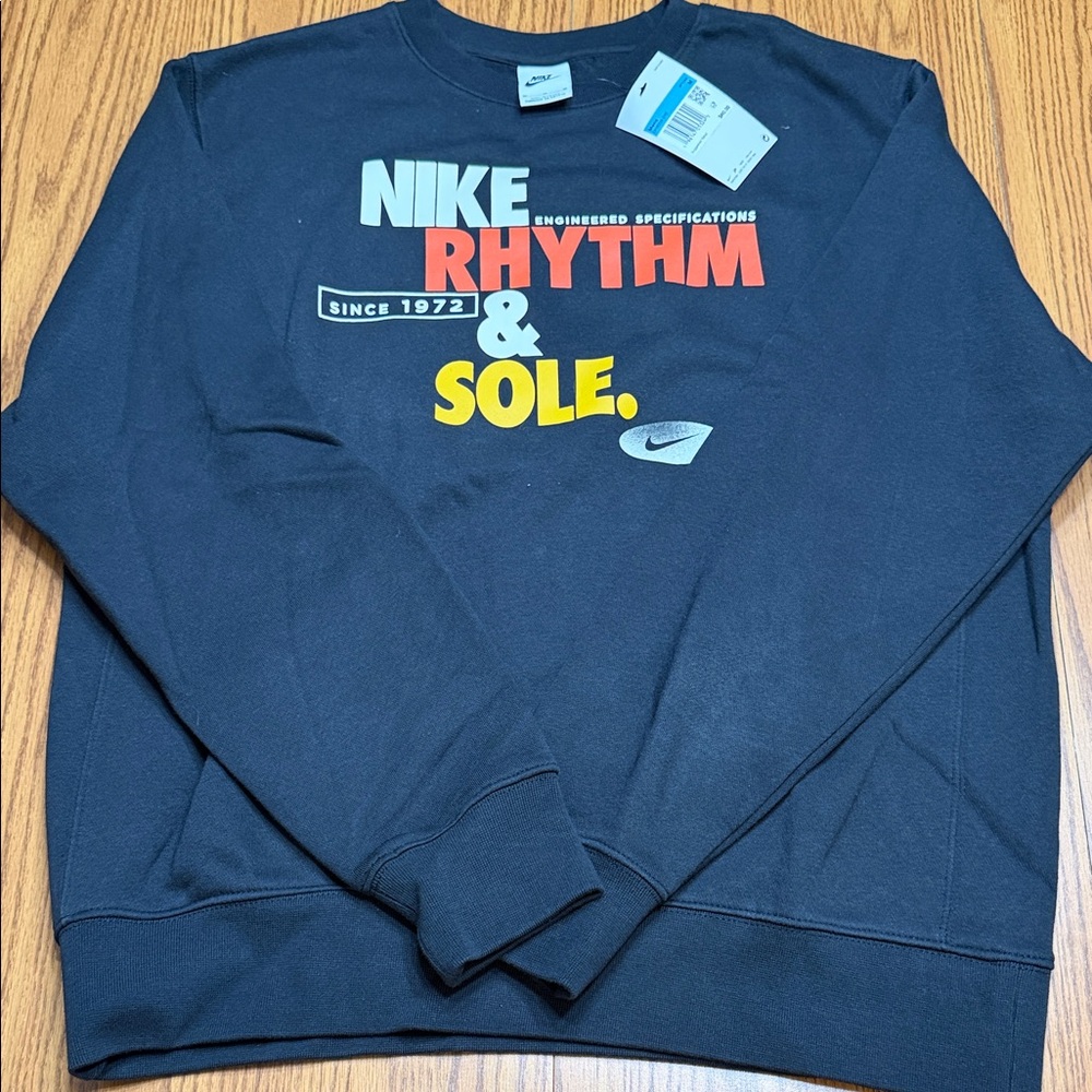 Nike Men's Black Crewneck Sweater with Bold Print